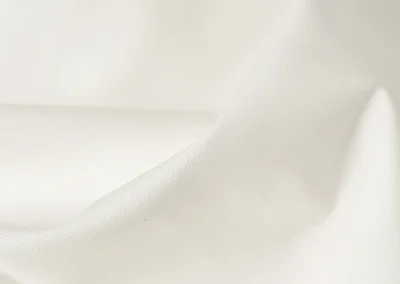 Catalogue photo 100: describe the garment or fabric shown, then add 'Lucky & Oscar Bangkok'