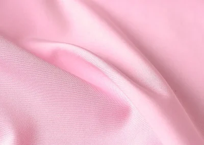 Catalogue photo 100: describe the garment or fabric shown, then add 'Lucky & Oscar Bangkok'