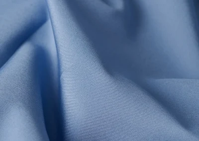 Catalogue photo 100: describe the garment or fabric shown, then add 'Lucky & Oscar Bangkok'