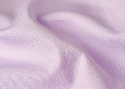 Catalogue photo 100: describe the garment or fabric shown, then add 'Lucky & Oscar Bangkok'